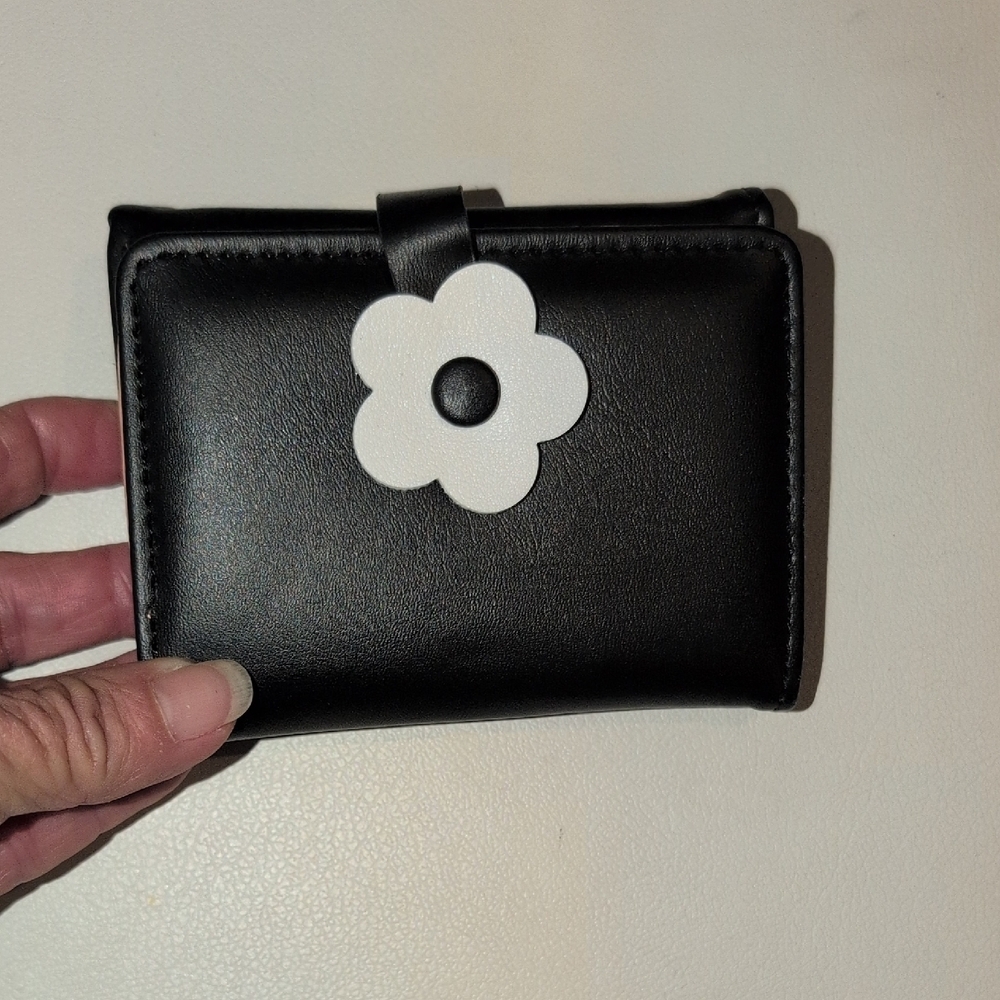 Chic Black Wallet with White Floral Accent